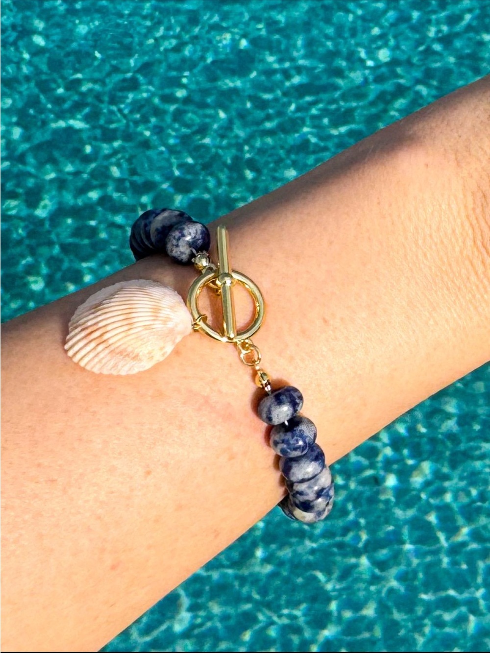 Blue Beaded Bracelet with Gold Toggle and Shell Charm